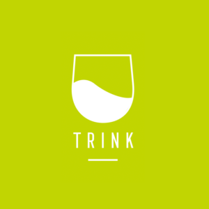 Green background with a white half-filled wine glass logo for Trink Magazine