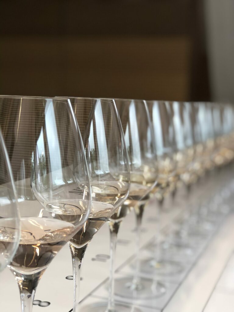 Row of glasses of Blanc de Noir wine