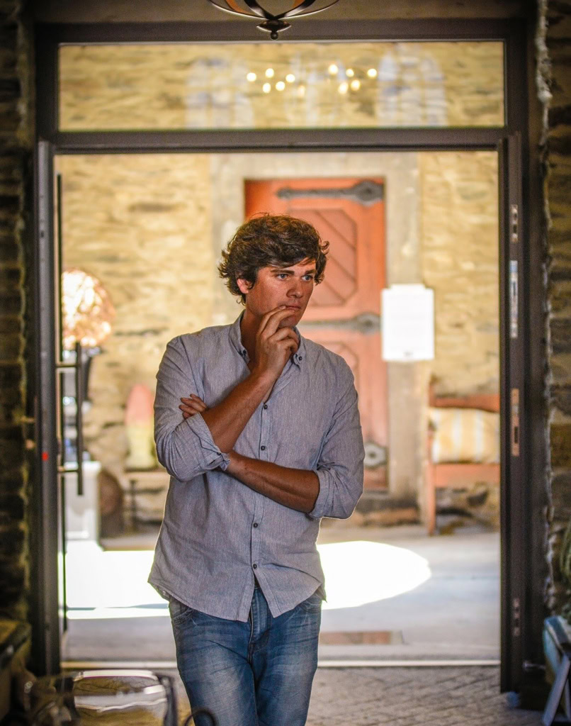 Winemaker Matthias Meier stands in his Mosel cellar doorway 