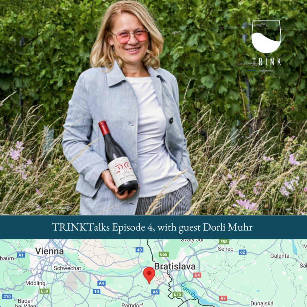 Austrian winemaker holds her Blaufränkisch in her Carnuntum vineyards